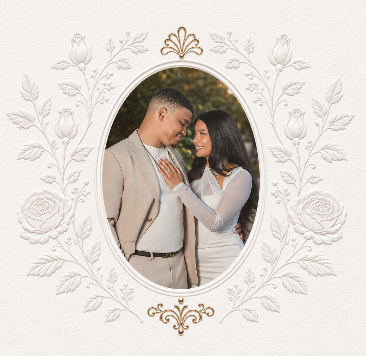 Mahdia and Josh in an oval floral portrait frame